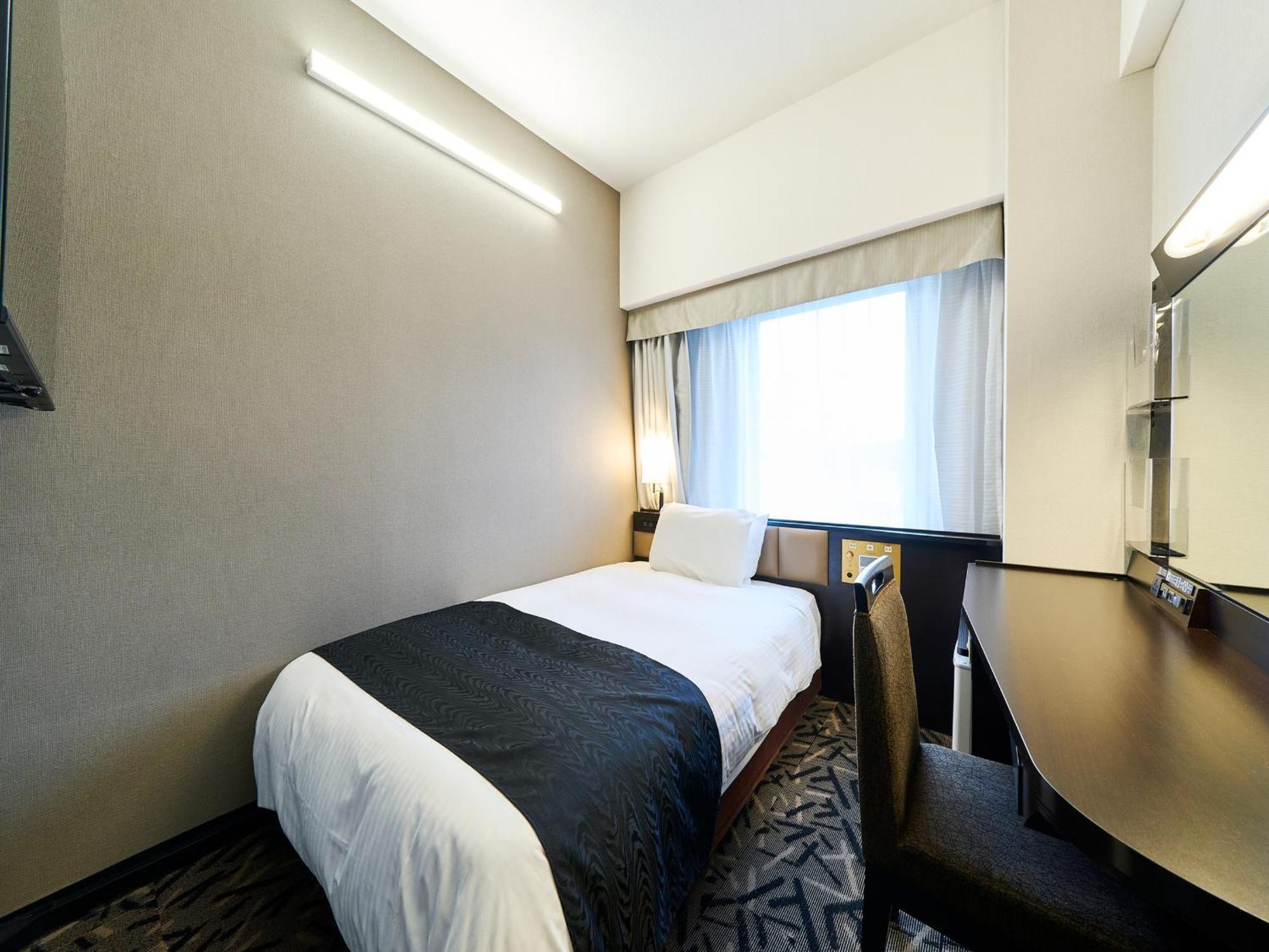 Apa Hotel Takaoka Marunouchi Bagian luar foto