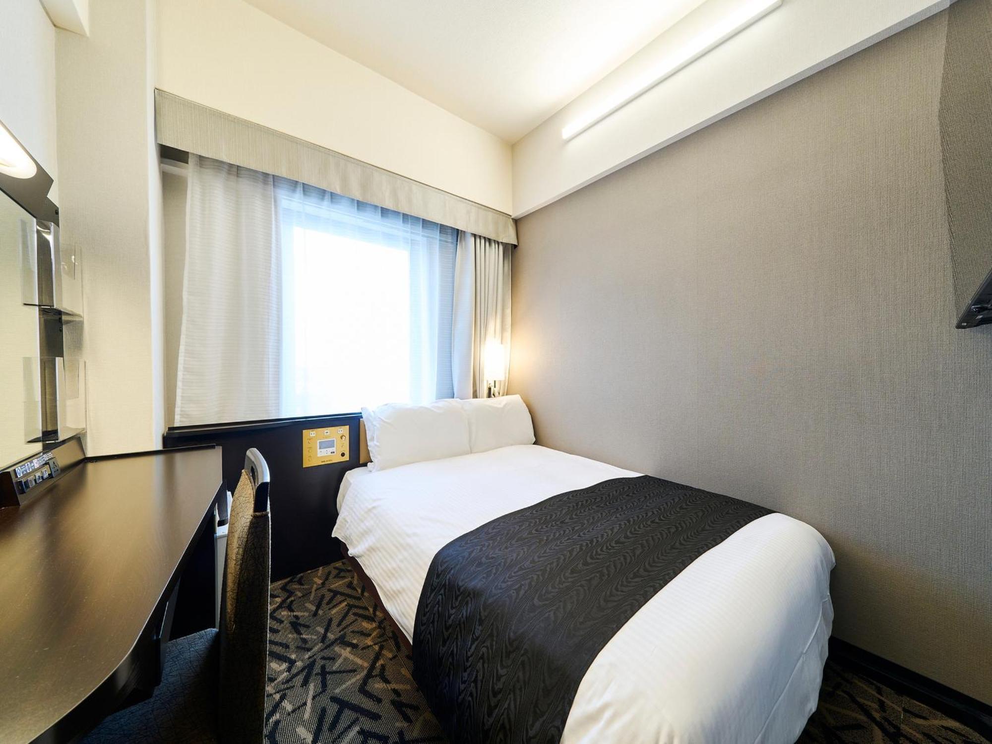 Apa Hotel Takaoka Marunouchi Bagian luar foto